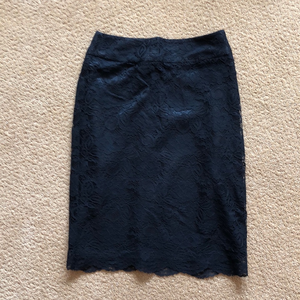 Fully lined black lace skirt